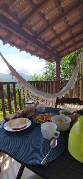 Suíte com varanda privativa na Casa Mirante